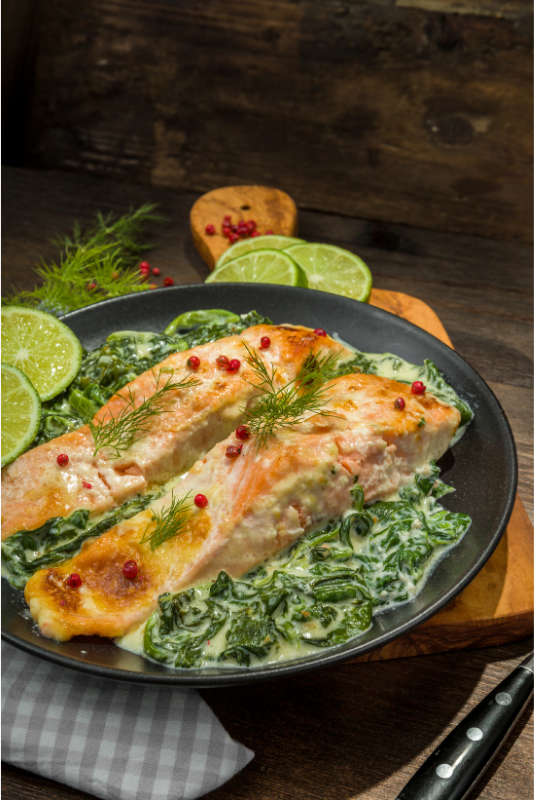 Pan fried salmon with cream and parsley sauce